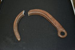 Premise 5. Unlike other destructive tests with new equipment, one test was conducted with an 8-inch J-hook that was at least three years old. It came from a rescue inventory and was used multiple times. The exterior of the J-hook was corroded. The WLL was listed as 5,400 lbs. The J-hook fractured at a peak load of 20,828 lbs., which is almost a 4:1 safety ratio, even after all of those years and use. The three-year old used and corroded J-hook (bottom) that had a WLL of 5,400 lbs. deformed open during its destructive test prior to a fracturing failure at a peak load of more than 20,000 lbs. Note how much larger/wider the opening is compared with the new J-hook. They were the same prior to the test. Premise 5. Unlike other destructive tests with new equipment, one test was conducted with an 8-inch J-hook that was at least three years old. It came from a rescue inventory and was used multiple times. The exterior of the J-hook was corroded. The WLL was listed as 5,400 lbs. The J-hook fractured at a peak load of 20,828 lbs., which is almost a 4:1 safety ratio, even after all of those years and use. The three-year old used and corroded J-hook (bottom) that had a WLL of 5,400 lbs. deformed open during its destructive test prior to a fracturing failure at a peak load of more than 20,000 lbs. Note how much larger/wider the opening is compared with the new J-hook. They were the same prior to the test.