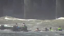 An off-duty Atlantic City, NJ, firefighter helped police and others to rescue three siblings who were struggling in the ocean and were eventually clinging to a drainage pipe Tuesday. An off-duty Atlantic City, NJ, firefighter helped police and others to rescue three siblings who were struggling in the ocean and were eventually clinging to a drainage pipe Tuesday.