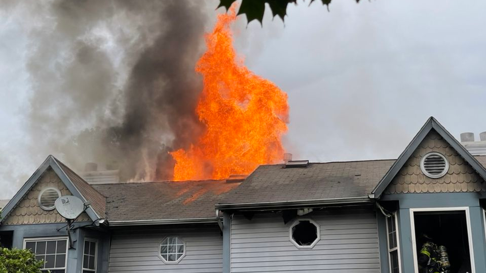 Firefighters from nine departments battled a three-alarm fire in a row of townhomes in Bethlehem Township, PA, on Monday that injured three firefighters.