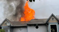 Firefighters from nine departments battled a three-alarm fire in a row of townhomes in Bethlehem Township, PA, on Monday that injured three firefighters.