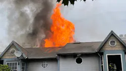 Firefighters from nine departments battled a three-alarm fire in a row of townhomes in Bethlehem Township, PA, on Monday that injured three firefighters.