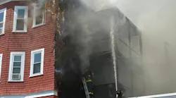 Boston firefighters battled a seven-alarm fire that spread among multiple triple-decker homes in the Dorchester neighborhood Wednesday.