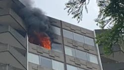 Dallas firefighters were able to contain a multi-alarm fire in a apartment high-rise Tuesday to a single unit in the complex. Dallas firefighters were able to contain a multi-alarm fire in a apartment high-rise Tuesday to a single unit in the complex.