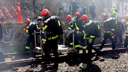 FDNY firefighters and rescue personnel participate in a training exercise for rebreathers at the East New York Rail Tunnel in Brooklyn.