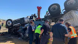Franklin County, WA, firefighters worked for around two hours to extricate a truck driver from the wreckage of his tractor-trailer, which overturned near Mesa on Monday.
