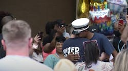A supporter hugs New Haven, CT, Fire Lt. Samod &apos;Nuke&apos; Rankins as he&apos;s released from the hospital Sunday.