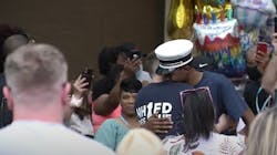 A supporter hugs New Haven, CT, Fire Lt. Samod 'Nuke' Rankins as he's released from the hospital Sunday. A supporter hugs New Haven, CT, Fire Lt. Samod 'Nuke' Rankins as he's released from the hospital Sunday.
