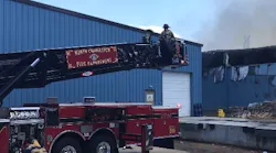 Firefighters from multiple departments battled a two-alarm fire that started on the warehouse dock of a cabinet business in North Charleston, SC, on Tuesday.