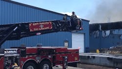 Firefighters from multiple departments battled a two-alarm fire that started on the warehouse dock of a cabinet business in North Charleston, SC, on Tuesday.