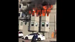 Roughly 50 Oakland, CA, firefighters battled a two-alarm fire at a building that was being renovation Tuesday Roughly 50 Oakland, CA, firefighters battled a two-alarm fire at a building that was being renovation Tuesday