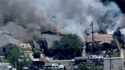 Three Orange, CA, firefighters were sent to the hospital with mild electrical injuries suffered while battling a fire that engulfed two houses Friday. Three Orange, CA, firefighters were sent to the hospital with mild electrical injuries suffered while battling a fire that engulfed two houses Friday.