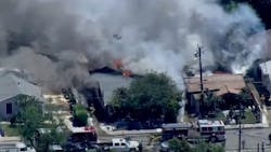Three Orange, CA, firefighters were sent to the hospital with mild electrical injuries suffered while battling a fire that engulfed two houses Friday.