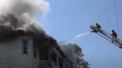 Firefighters from around the area battled a massive multi-alarm fire in Revere, MA, that tore through an apartment building and spread to multiple buildings Thursday.