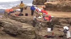 At least three people were killed and over two dozen people injured after a suspected human smuggling boat capsized off the coast of San Diego on Sunday.