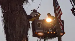 San Miguel, CA, firefighters rescued an injured tree trimmer trapped about 70 fee in the air Thursday.
