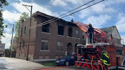 One St. Louis firefighter suffered a serious eye injury and another suffered minor burns battling a fire at an apartment building Monday.