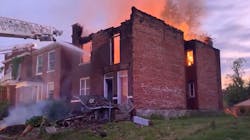 Two St. Louis firefighters injured in a partial building collapse during a structure fire Sunday.