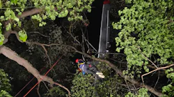 Whitewater, WI, firefighters used a rope system to rescue three people suspended 75 feet above the ground when their plane crashed in the Kettle Moraine Forest on Saturday.