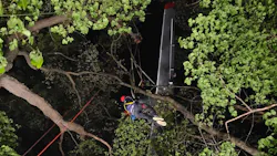 Whitewater, WI, firefighters used a rope system to rescue three people suspended 75 feet above the ground when their plane crashed in the Kettle Moraine Forest on Saturday. Whitewater, WI, firefighters used a rope system to rescue three people suspended 75 feet above the ground when their plane crashed in the Kettle Moraine Forest on Saturday.