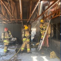 Two Phoenix firefighters suffered burns to their ears and hands battling a house fire Sunday. Two Phoenix firefighters suffered burns to their ears and hands battling a house fire Sunday.