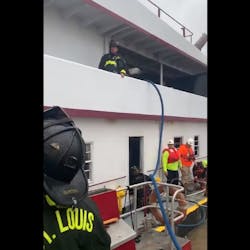 Two St. Louis firefighters were injured battling a fire that broke out on a tugboat on the Mississippi River on Tuesday. Two St. Louis firefighters were injured battling a fire that broke out on a tugboat on the Mississippi River on Tuesday.