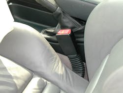 The accordion-style rubber sleeve that’s below the female seatbelt buckle indicates that a buckle-lowering pretensioner system might be present. The accordion-style rubber sleeve that’s below the female seatbelt buckle indicates that a buckle-lowering pretensioner system might be present.