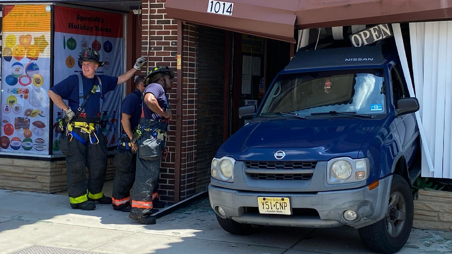 One person was injured after a driver crashed into the storefront of an Asbury Park, NJ, driving school Monday.