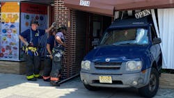 One person was injured after a driver crashed into the storefront of an Asbury Park, NJ, driving school Monday.