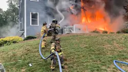 Firefighters from multiple departments battled a fast-moving house fire Friday.