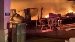 A tractor-trailer hauling fireworks caught fire following a rollover accident along the Tri-State Tollway in Berkeley, IL, early Friday. A tractor-trailer hauling fireworks caught fire following a rollover accident along the Tri-State Tollway in Berkeley, IL, early Friday.