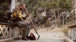 A viral photo of Capt. Justin Grunewald with the Mill Creek, CA, hotshots resting after working to contain the Willow Fire in Big Sur has become a symbol for the foreboding 2021 wildfire season. A viral photo of Capt. Justin Grunewald with the Mill Creek, CA, hotshots resting after working to contain the Willow Fire in Big Sur has become a symbol for the foreboding 2021 wildfire season.