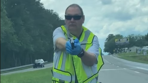 A viral video captured an Acme-Delco-Riegelwood firefighter pulling a gun and pointing at a driver at a crash scene in Columbus County, NC, on Saturday.