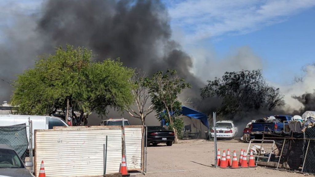 Three Drexel Heights, AZ, firefighters were shocked by an llegal electrical sstem while battling a fire involving three vehicles and a mobile home Tuesday.