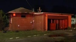 East St. Louis, IL, Firefighters rescued a woman suffering from burns who trapped inside her bathroom after her house caught fire Monday. East St. Louis, IL, Firefighters rescued a woman suffering from burns who trapped inside her bathroom after her house caught fire Monday.