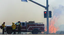 Firefighters battle the Farm Fire in Hesperia, CA, on Thursday.