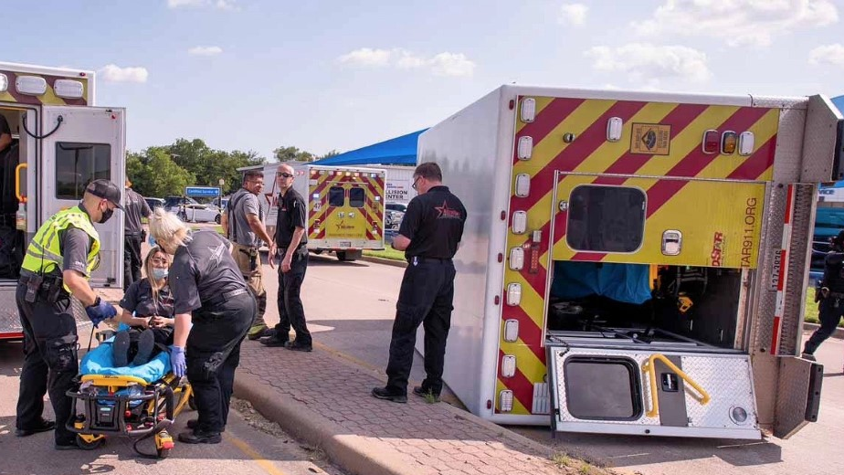 Three medics were injured when their MedStar ambulance rolled over after a collided with the unit in Fort Worth, TX, on Sunday.