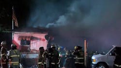 Firefighters from two departments stopped a fire from spreading throughout a Fresno, CA, mobile home community late Wednesday after flames destroyed two trailers and damaged at least two others. Firefighters from two departments stopped a fire from spreading throughout a Fresno, CA, mobile home community late Wednesday after flames destroyed two trailers and damaged at least two others.