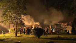 Two people died in a trailer home fire late Tuesday that had about 80 firefighters from more than a half-dozen departments responding.