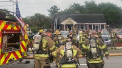 A Horry County, SC, firefighter was injured battling a fire that erupted at a car dealership in Little River on Sunday.