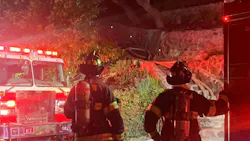 Crews from multiple departments battled an 'arduous' two-alarm house fire in Mill Valley, CA, early Sunday that injured two firefighters.