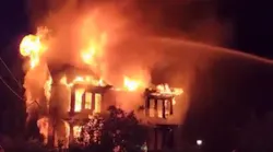 A Northwood, NH, firefighter suffered burns battling a three-alarm house fire Thursday.