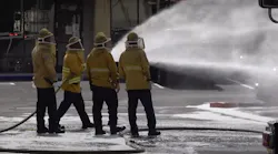 Orange County, CA, firefighters use foam to disperse a swarm of attacking bees that sent three people to the hospital Tuesday.