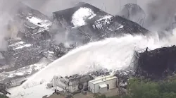 An industrial firefighting team was called in to help battle the ongoing fire at the Chemtool plant in Rockton, IL, and the number of fire departments deployed increased from 45 to 84 on Tuesday.