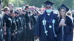 Hundreds of first responders line the graduation ceremony entrance Thursday to greet the daughter of Los Angeles County firefighter Tory Carlon, who was fatally shot by a colleague at the department's Agua Dulce station Tuesday. Hundreds of first responders line the graduation ceremony entrance Thursday to greet the daughter of Los Angeles County firefighter Tory Carlon, who was fatally shot by a colleague at the department's Agua Dulce station Tuesday.