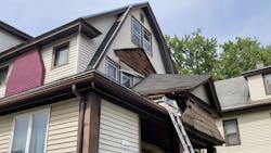 Springfield, MA, firefighters rescued a worker who was trapped under debris from the collapse of a second-story porch roof Wednesday. Springfield, MA, firefighters rescued a worker who was trapped under debris from the collapse of a second-story porch roof Wednesday.