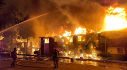 DeKalb County firefighters rescued one person who was asleep as flames engulfed the two-story building.