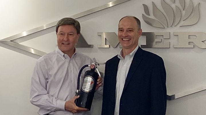 Rep. Mike Rogers, right, receives the 2021 Life Safety Advocate Award from Fire Equipment Manufacturers&rsquo; Association President Guy Jones.