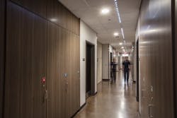 Double-sided lockers allow for the arriving-shift members to access their lockers without disturbing firefighters who are in the rooms. Double-sided lockers allow for the arriving-shift members to access their lockers without disturbing firefighters who are in the rooms.