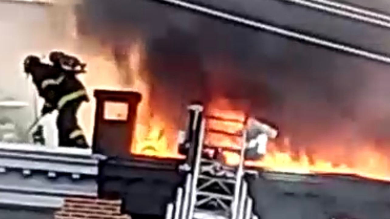 Baltimore City firefighters battled a two-alarm fire that broke out at six, three-story rowhouses in South Baltimore on Thursday.
