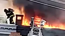 Baltimore City firefighters battled a two-alarm fire that broke out at six, three-story rowhouses in South Baltimore on Thursday.
